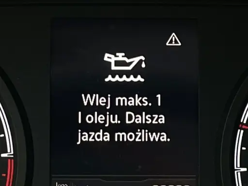 Po wymianie oleju świeci się kontrolka oleju. Komunikat "Wlej maks. 1 l oleju. Dalsza jazda możliwa." sugeruje niski poziom.