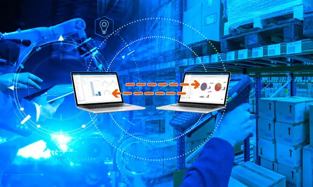 Nowoczesny magazyn z robotami i systemami, gdzie elektroniczna wymiana danych usprawnia logistykę.